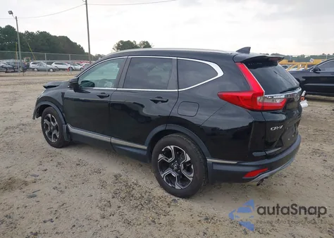 2018 Honda Cr-V Touring z USA, uszkodzony, nr VIN 7FARW1H95JE054478